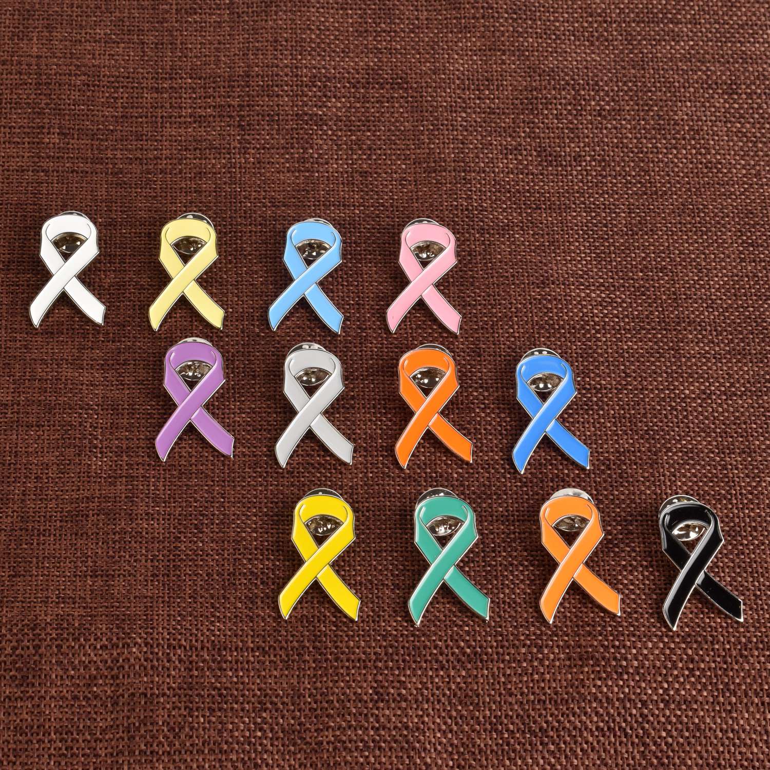 Blue, pink, yellow, orange, black ribbon lapel pins