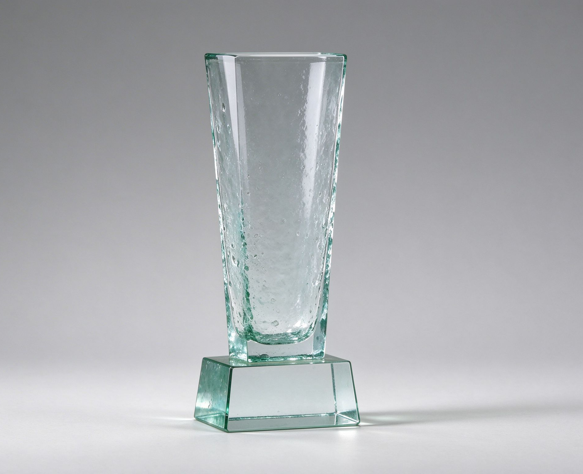 Recycled glass trophy with clean modern finish for corporate recognition.jpg.png